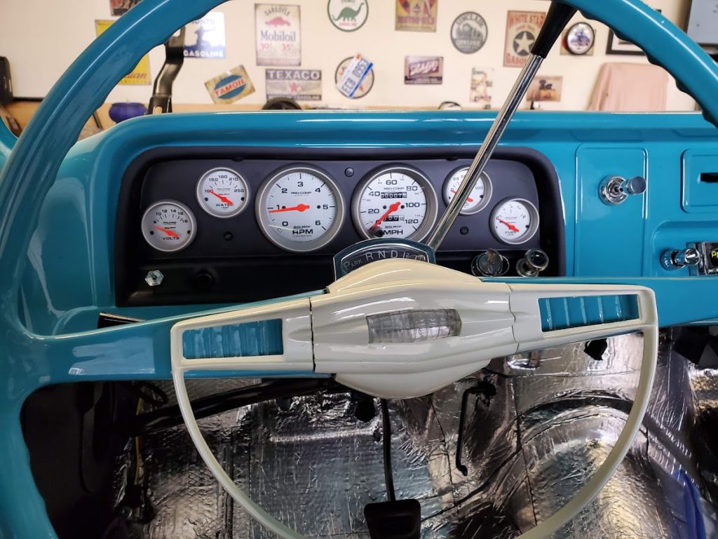 Custom dash panel and gauges behind the steering wheel